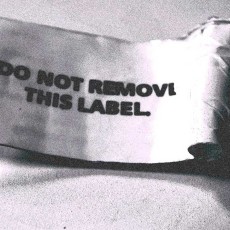A removed label that has the words, "DO NOT REMOVE THIS LABEL"
