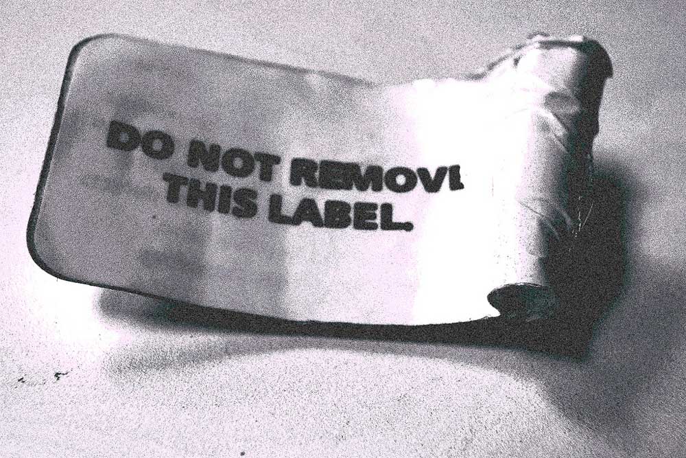 A removed label that has the words, "DO NOT REMOVE THIS LABEL"